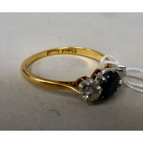 59 - An 18ct gold diamond and garnet set ring&nbsp; (approx. 2grms)