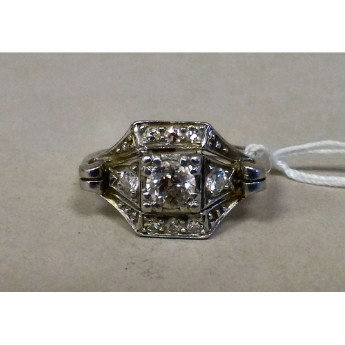 61 - A white metal diamond set ring&nbsp; stamped 'plat'&nbsp; (approx. 4.4grms)