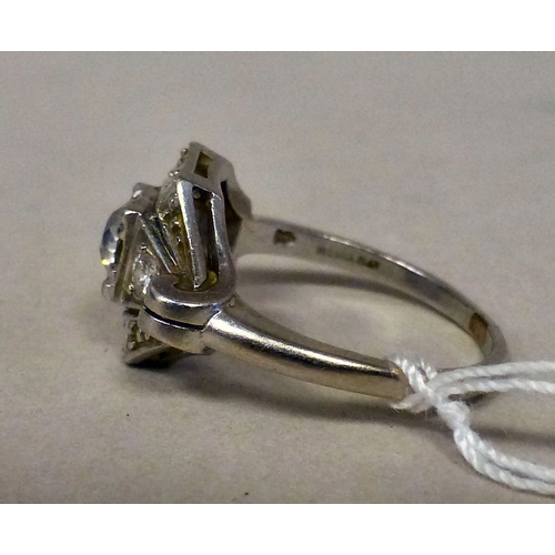 61 - A white metal diamond set ring&nbsp; stamped 'plat'&nbsp; (approx. 4.4grms)