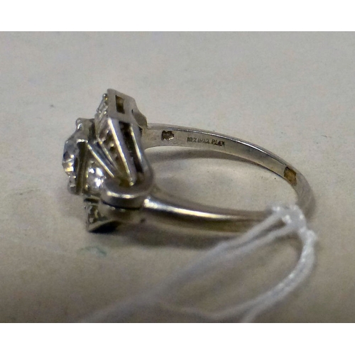 61 - A white metal diamond set ring&nbsp; stamped 'plat'&nbsp; (approx. 4.4grms)