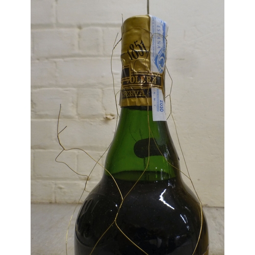 15 - A bottle of Baron de Sigognac Armagnac, in a wooden box; and a bottle of Etiqueta Negra Gran Reserva... 