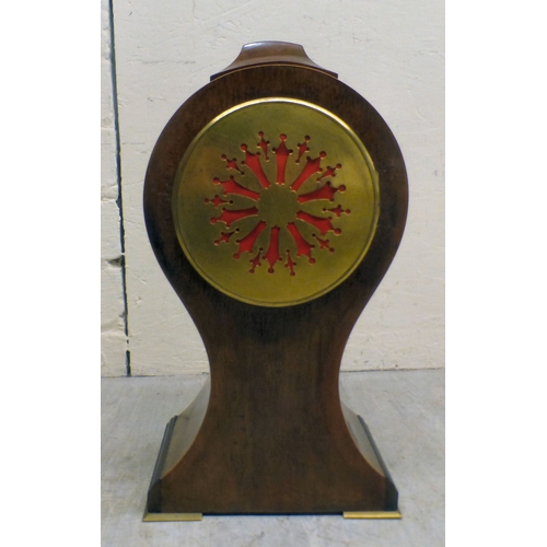 22 - An Edwardian string inlaid mahogany, balloon design mantel clock; the movement faced by a Roman dial... 