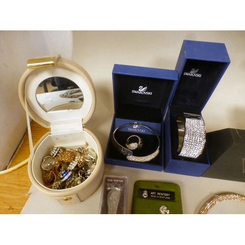 24 - Costume jewellery: to include a Kendall & James gold tone, hinged bangle
