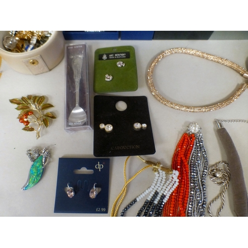 24 - Costume jewellery: to include a Kendall & James gold tone, hinged bangle