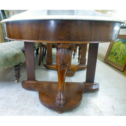 37 - A late Victorian Duchess design mahogany framed marble topped demi-lune washstand, united by cabriol... 