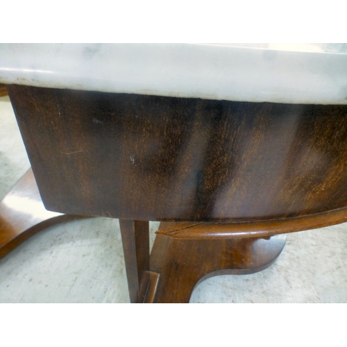 37 - A late Victorian Duchess design mahogany framed marble topped demi-lune washstand, united by cabriol... 