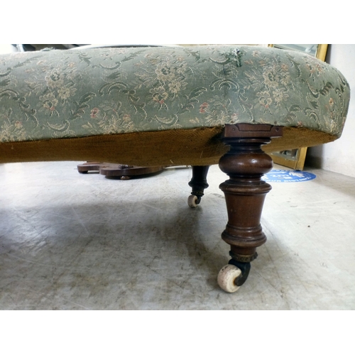 38 - A late Victorian mahogany showwood framed and later fabric upholstered chaise longue, raised on turn... 