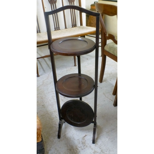 40 - Small furniture: to include a mid 20thC brass tray   30