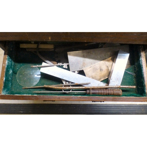 41 - A vintage tool chest with a rising hinged front, enclosing six drawers&nbsp; 13