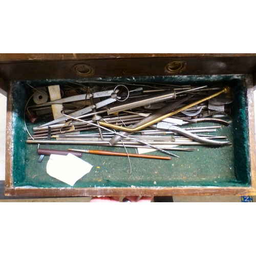 41 - A vintage tool chest with a rising hinged front, enclosing six drawers&nbsp; 13