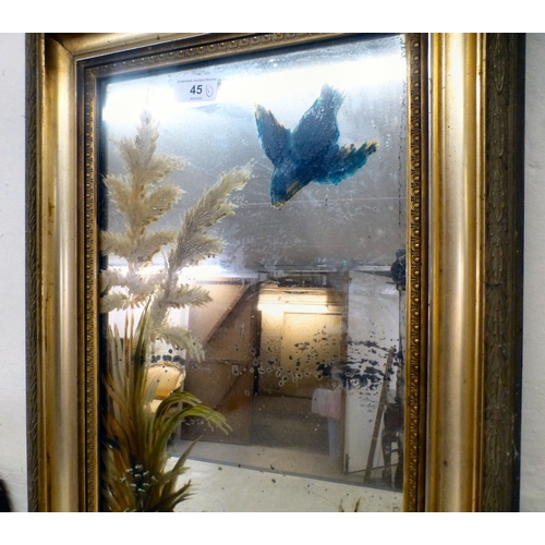 45 - A vintage mirror, the overpainted plate set in a moulded gilt frame  14