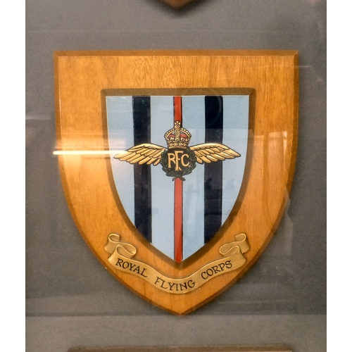 48 - A framed display of RFC/RAF themed, shield shaped plaques  26