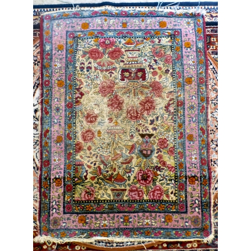 51 - Three machine made rugs&nbsp; various sizes; and another, North Central Persian style prayer mat&nbs... 