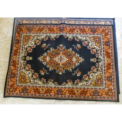 51 - Three machine made rugs&nbsp; various sizes; and another, North Central Persian style prayer mat&nbs... 