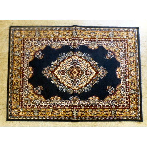 51 - Three machine made rugs&nbsp; various sizes; and another, North Central Persian style prayer mat&nbs... 