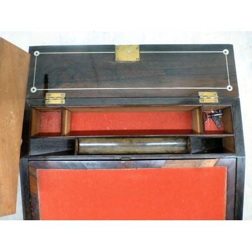 6 - A late 19thC mother-of-pearl inlaid, rosewood veneered writing slope of angled form, enclosing a par... 