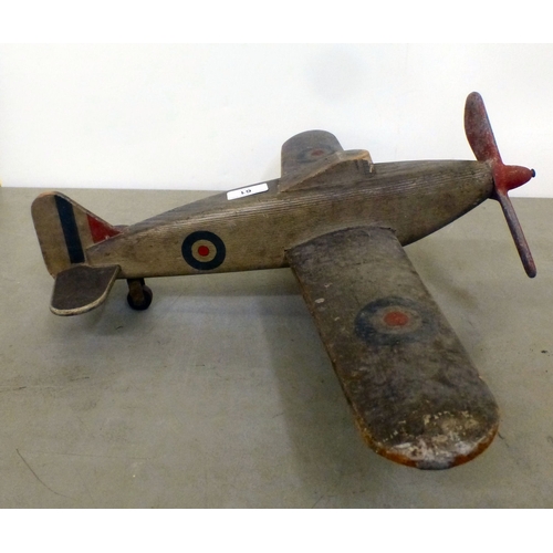 61 - A World War II carved and painted wooden Hawker Hurricane toy aeroplane with a metal propellor&nbsp;... 