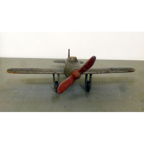 61 - A World War II carved and painted wooden Hawker Hurricane toy aeroplane with a metal propellor&nbsp;... 