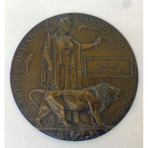 10 - A World War I bronze death plaque, the inscription for 'Thomas Lloyd Black'&nbsp; 4.75