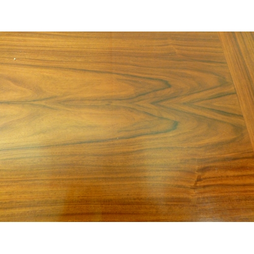 12 - A mid 20thC Danish Skovby rosewood sideboard with four cupboard doors, enclosing interior shelves an... 