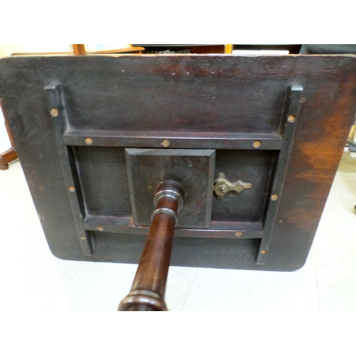 16 - A George III mahogany pedestal table, the tip-top raised on a tripod base&nbsp; 28