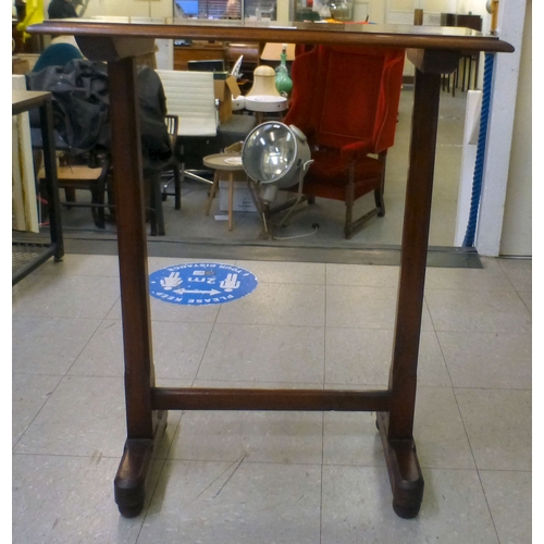 17 - An Arts & Crafts design mahogany side table, raised on square, chamfered legs&nbsp; 32