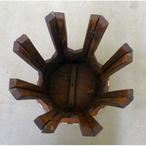 19 - An Anglo Indian Hoshiarpur bone inlaid, fruitwood occasional table with an octagonal top, raised on ... 