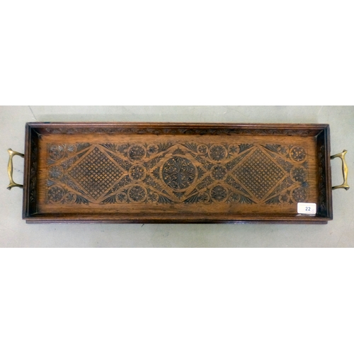 22 - Anglo Indian collectables: to include an early 20thC fruitwood serving tray with opposing brass hand... 