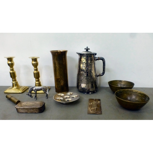 24 - Metalware: to include a pair of late 18thC brass ejector candlesticks&nbsp; 6