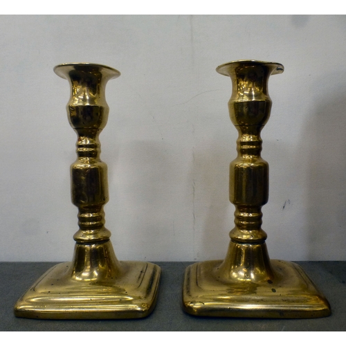 24 - Metalware: to include a pair of late 18thC brass ejector candlesticks&nbsp; 6