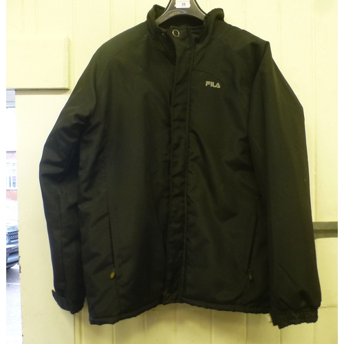26 - A men's black polyester FILA jacket&nbsp; size Large