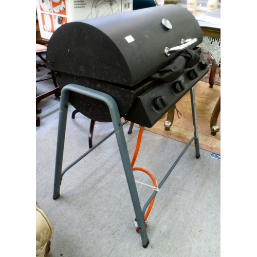 29 - A modern Texas gas powered cylinder BBQ&nbsp; 37