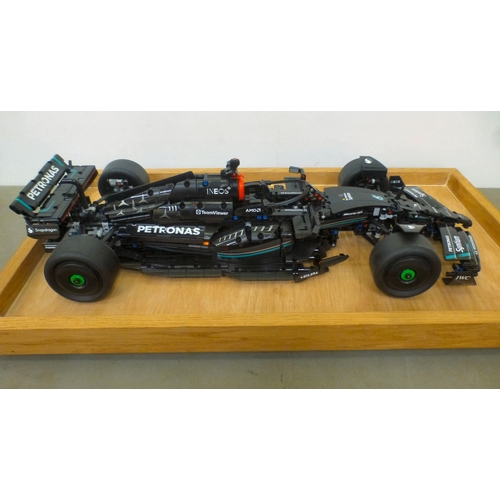37 - A circa 2023 scratch built Lego model, a Mercedes F1 car, on stand  23.5