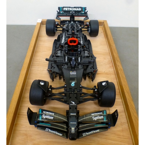 37 - A circa 2023 scratch built Lego model, a Mercedes F1 car, on stand  23.5