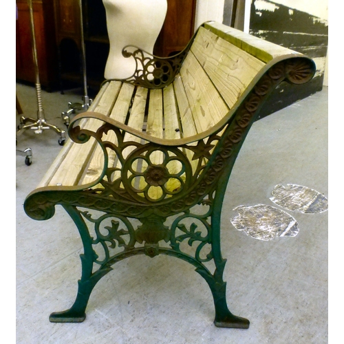 49 - A cast metal framed garden bench with pine slats&nbsp; 28.5