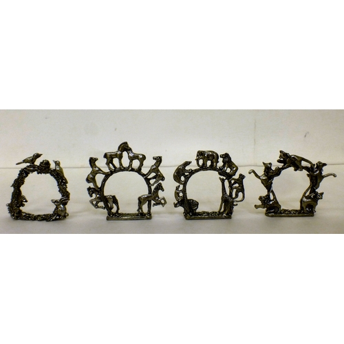 5 - Eight Wanda Scruby design pewter napkin rings, decorated with a variety of animals&nbsp; each 2