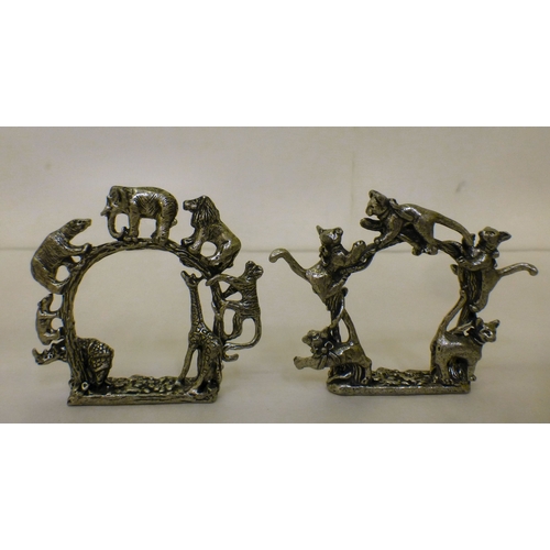 5 - Eight Wanda Scruby design pewter napkin rings, decorated with a variety of animals&nbsp; each 2