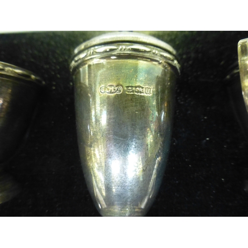 57 - A silver three piece condiments set&nbsp; comprising a mustard pot, a pepper pot and salt&nbsp; Birm... 