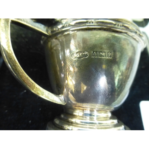 57 - A silver three piece condiments set&nbsp; comprising a mustard pot, a pepper pot and salt&nbsp; Birm... 