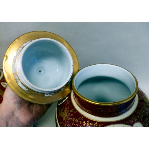 101 - A pair of European lidded vases of bulbous form, each decorated in gilt and red with classical scene... 