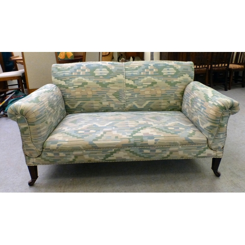 108 - A late Victorian/Edwardian and later fabric upholstered drop-end two person settee, raised on square... 