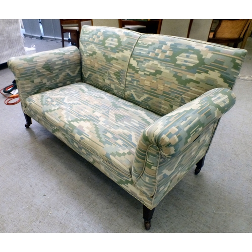 108 - A late Victorian/Edwardian and later fabric upholstered drop-end two person settee, raised on square... 