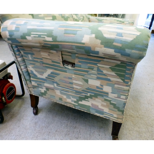 108 - A late Victorian/Edwardian and later fabric upholstered drop-end two person settee, raised on square... 