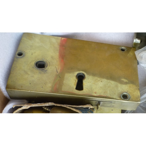 111 - Late 19th/early 20thC door furniture: to include locks; and knobs