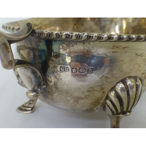 191 - A silver sauce boat with a gadrooned lip, raised on pad feet&nbsp; Sheffield 1944&nbsp; (approx. 247... 