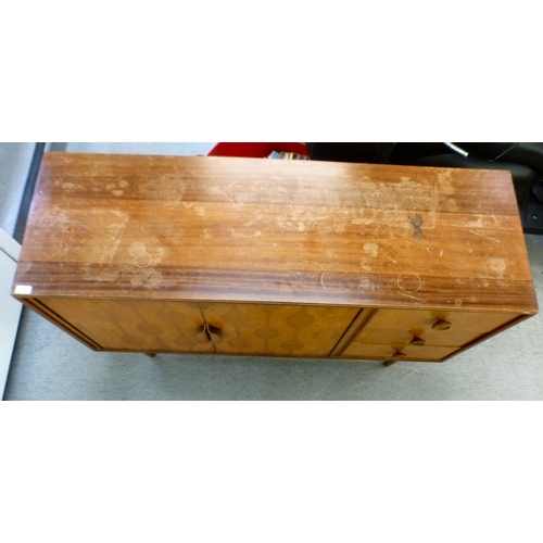 197 - A Vanson Robert Heritage mixed fruitwood sideboard with an arrangement of two doors and three drawer... 