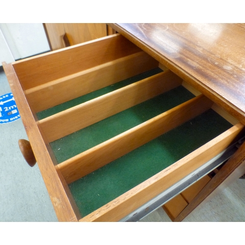 197 - A Vanson Robert Heritage mixed fruitwood sideboard with an arrangement of two doors and three drawer... 