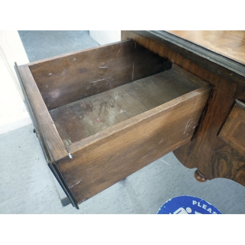 198 - An early 20thC walnut veneered side table with three drawers, raised on cabriole legs and pad feet&n... 