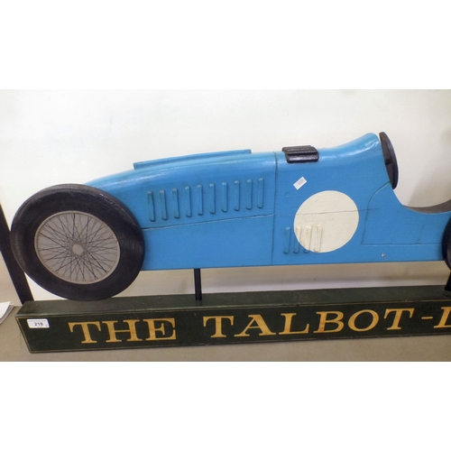 218 - A carved and overpainted wooden sign 'The Talbot-Lago', depicting a vintage racing car  16