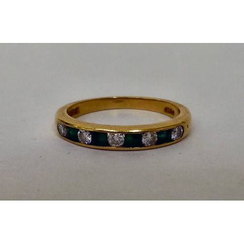 221 - An 18ct gold, diamond and emerald set ring  (approx. 3grms)